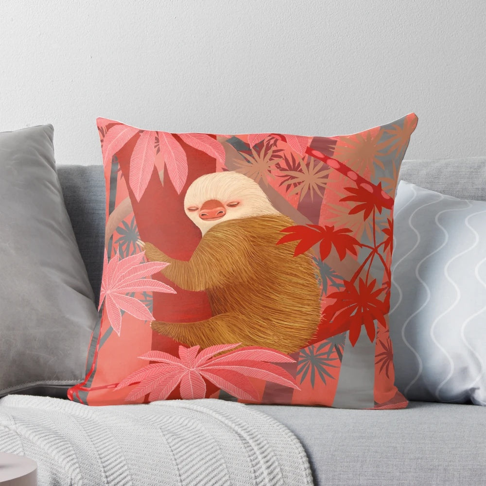Colorful throw pillow featuring a vibrant jungle scene with sloths