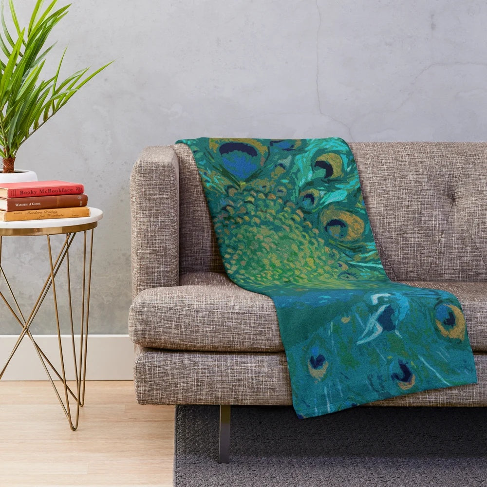 Textured peacock plush blanket with iridescent feather design