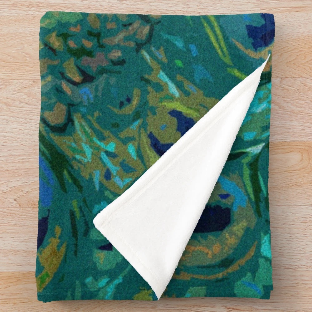 Textured peacock plush blanket with iridescent feather design