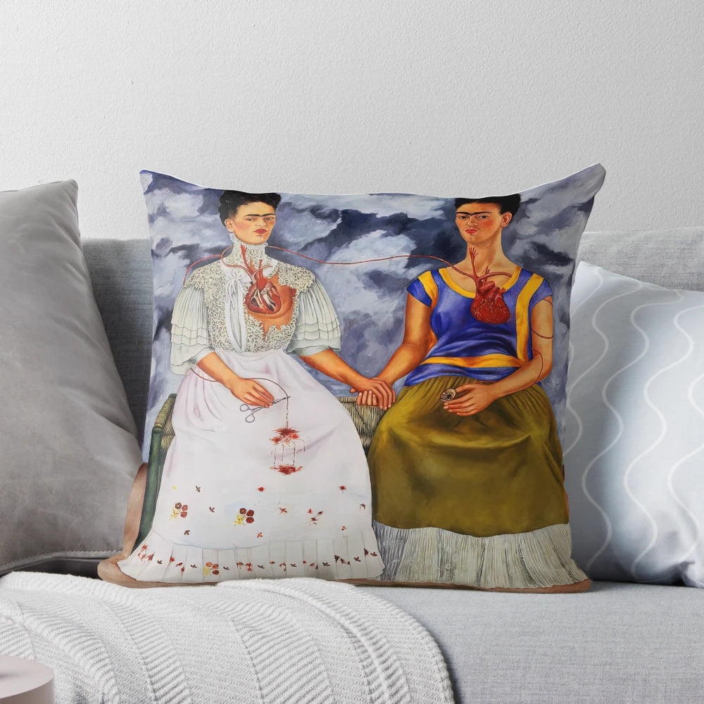 Colorful Frida Kahlo inspired pillow depicting "The Two Fridas" painting