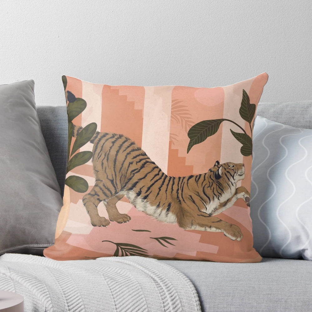 Boho-style tiger print accent pillow in tropical green, pink, and rust colors