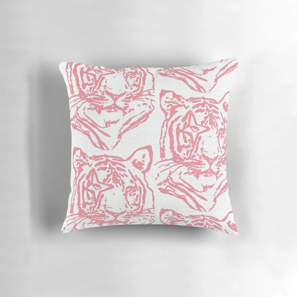 Soft, plush pink pillow with a playful tiger print design
