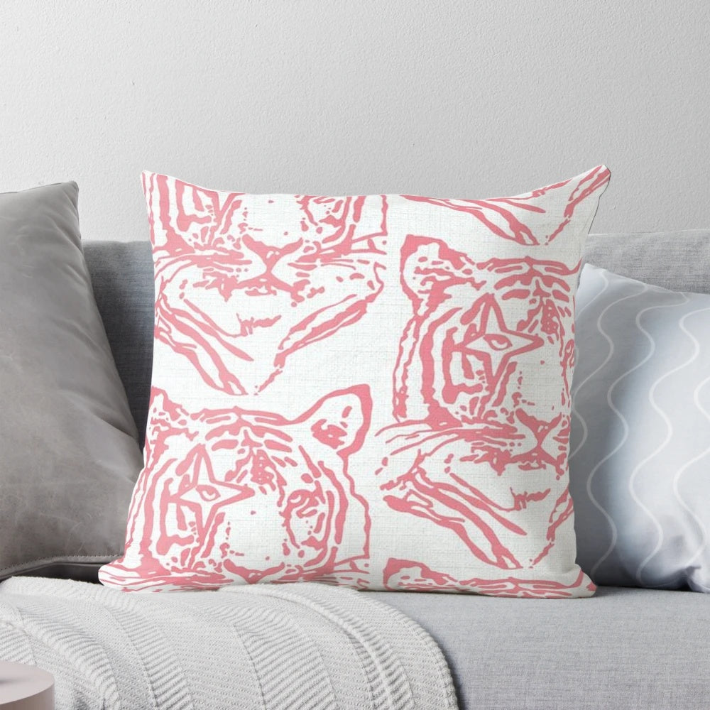 Soft, plush pink pillow with a playful tiger print design