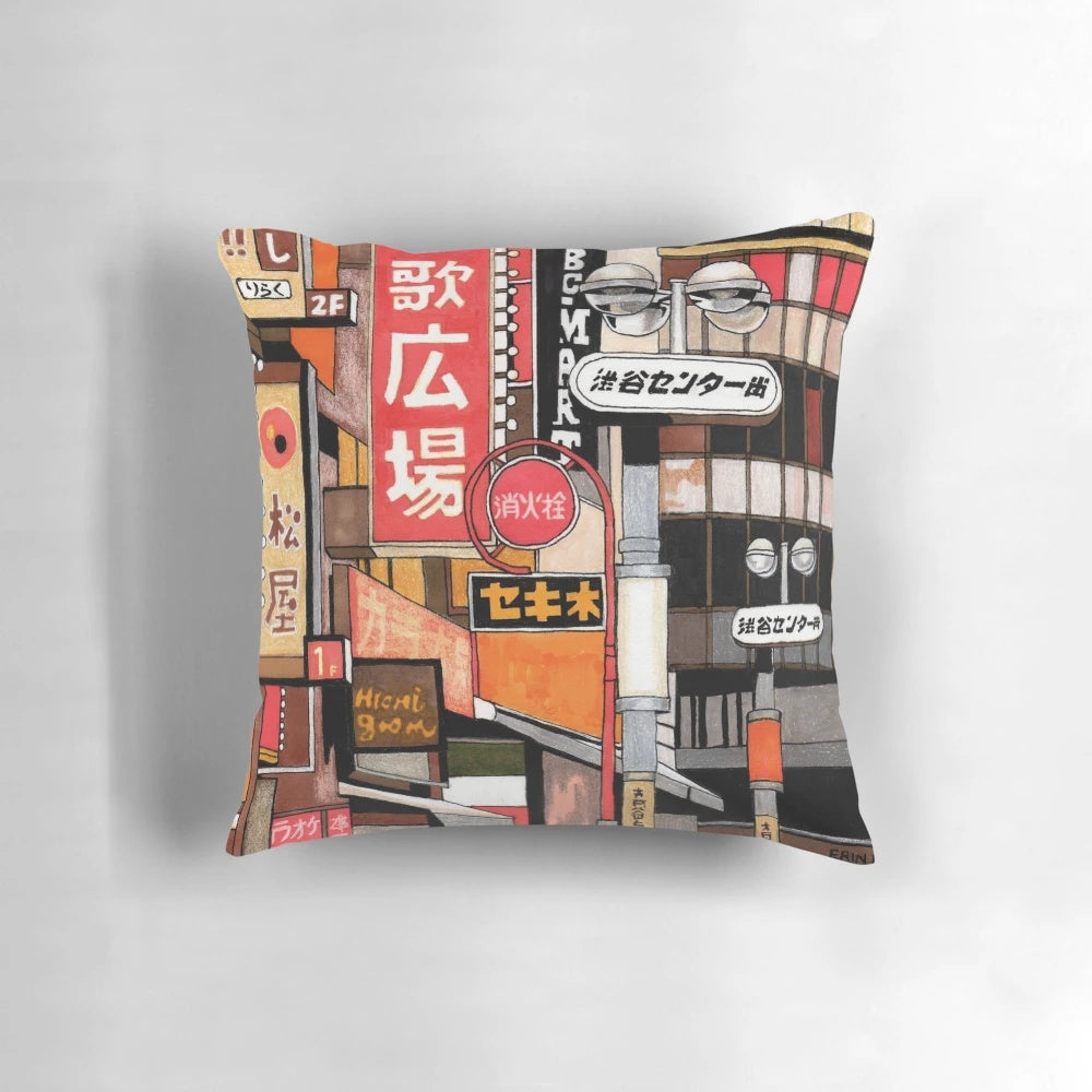 Colorful throw pillow featuring Japanese-style street signs and neon lights