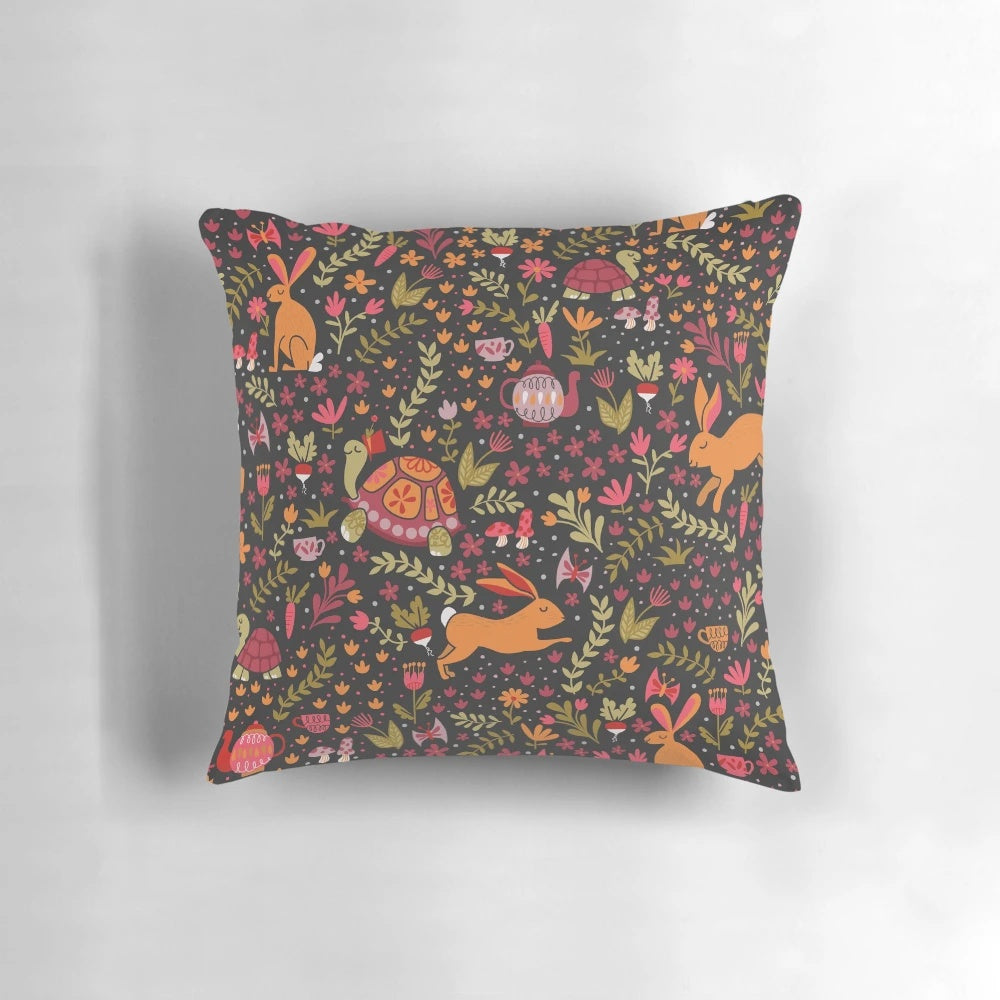 Colorful decorative throw pillow featuring a whimsical design of a tortoise and hare in a botanical garden setting.