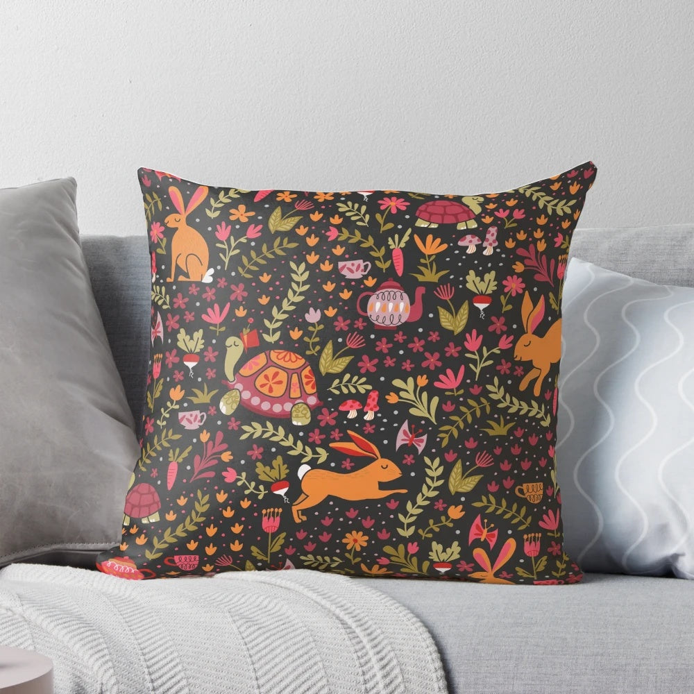 Colorful decorative throw pillow featuring a whimsical design of a tortoise and hare in a botanical garden setting.