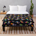 Plush toucan-themed blanket in tropical colors