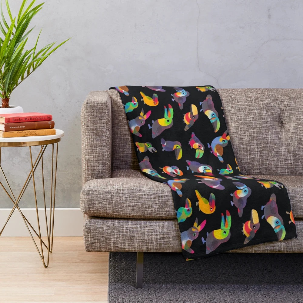 Plush toucan-themed blanket in tropical colors