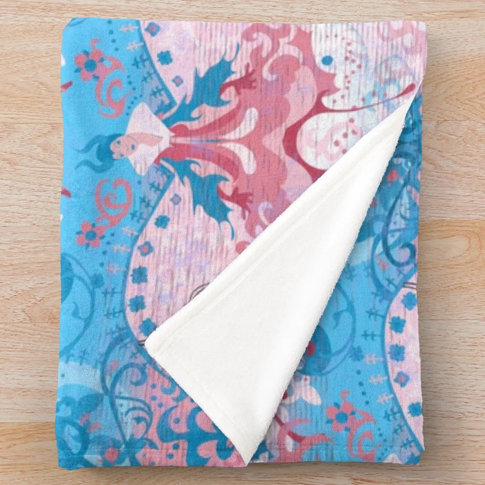 Colorful plush blanket featuring a transgender pride flag design and a dragon damask pattern