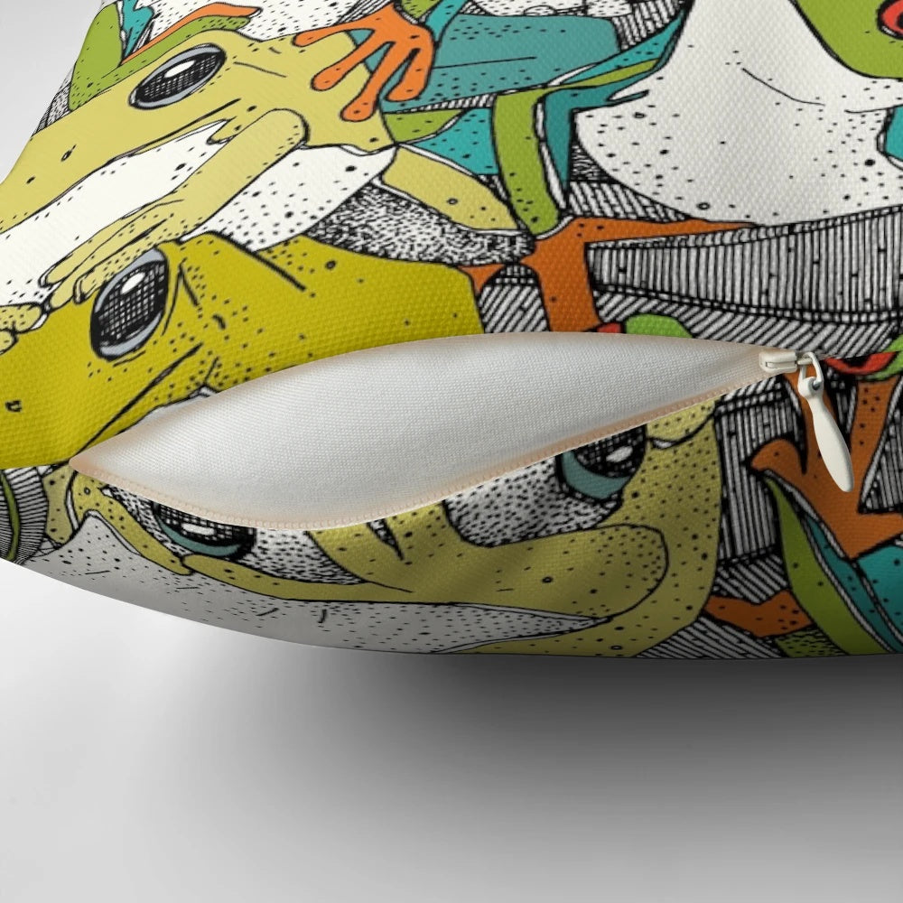 Colorful throw pillow featuring a vibrant tree frog design against a nature-inspired background.