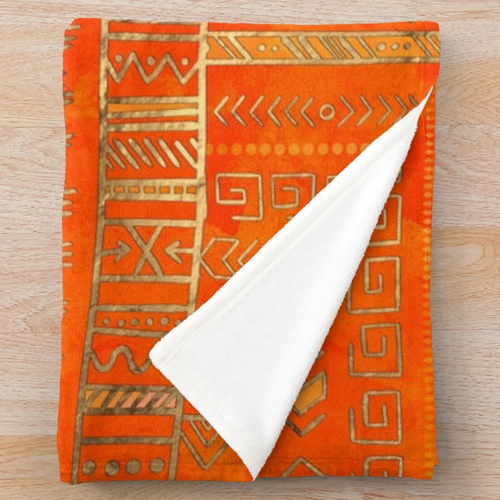 Tribal ethnic geometric pattern gold on orange plush blanket