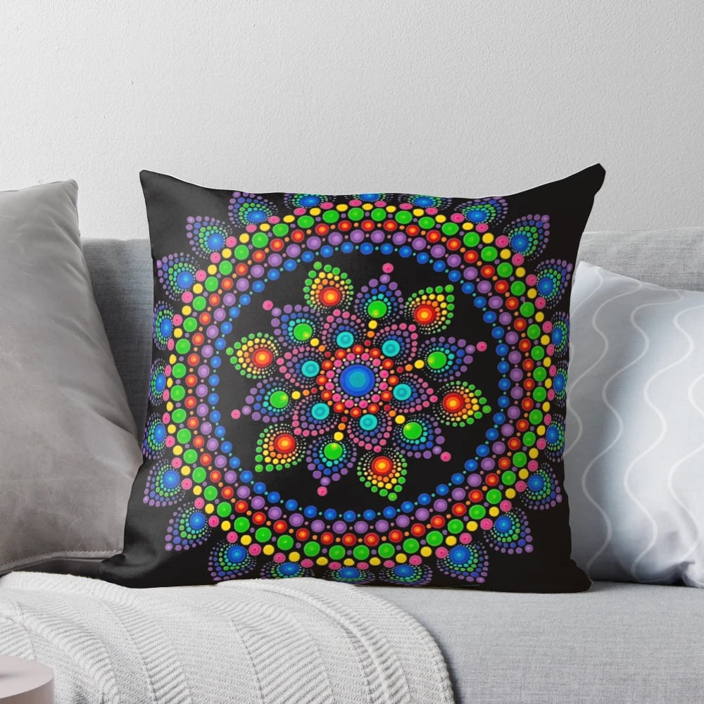 Vibrant rainbow-colored trippy mandala design printed on a soft, plush throw pillow.
