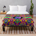 Vibrant trippy pattern plush blanket inspired by the jam band String Cheese Incident