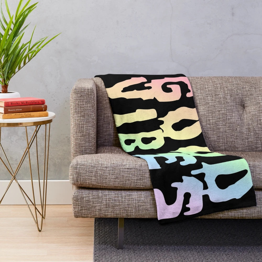 Colorful trippy plush blanket with melting, psychedelic design