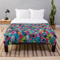 Colorful plush blanket with vibrant trolls pattern design
