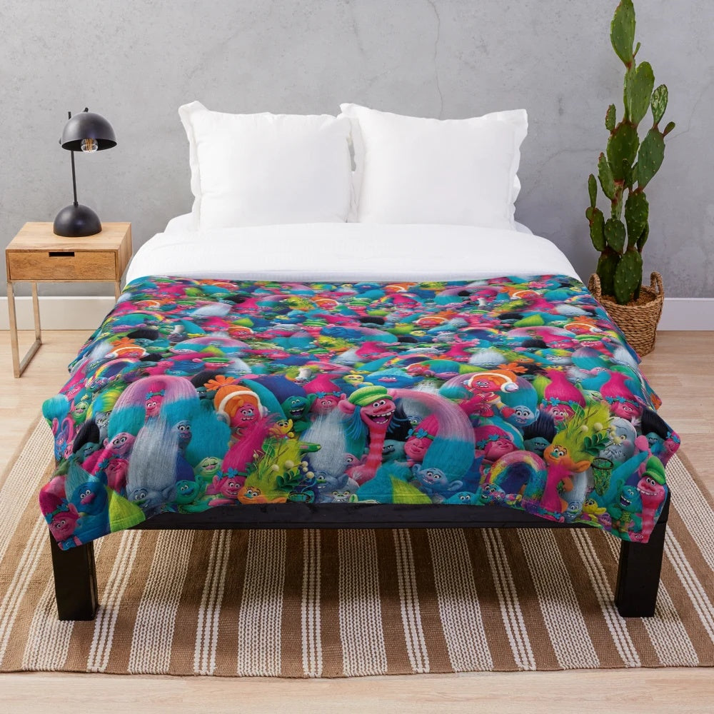 Colorful plush blanket with vibrant trolls pattern design