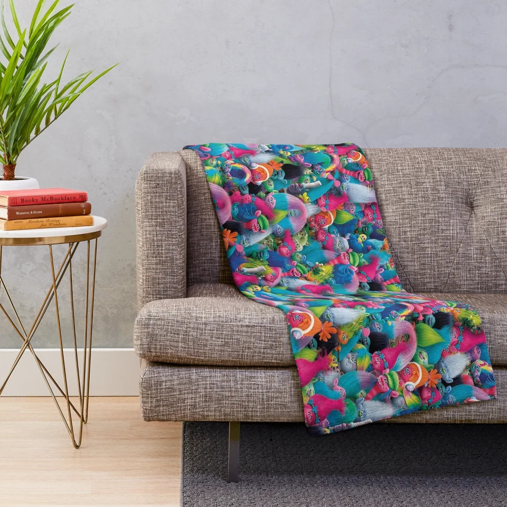 Colorful plush blanket with vibrant trolls pattern design
