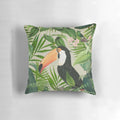 Decorative pillow featuring a vibrant print of a toucan and hummingbird in a lush, tropical setting.