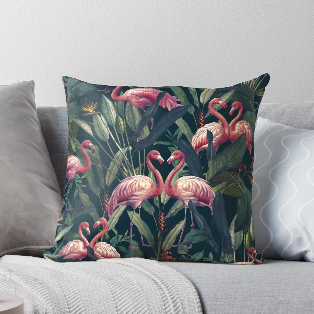 Closeup image of a tropical flamingo watercolor pattern on a plush pillow