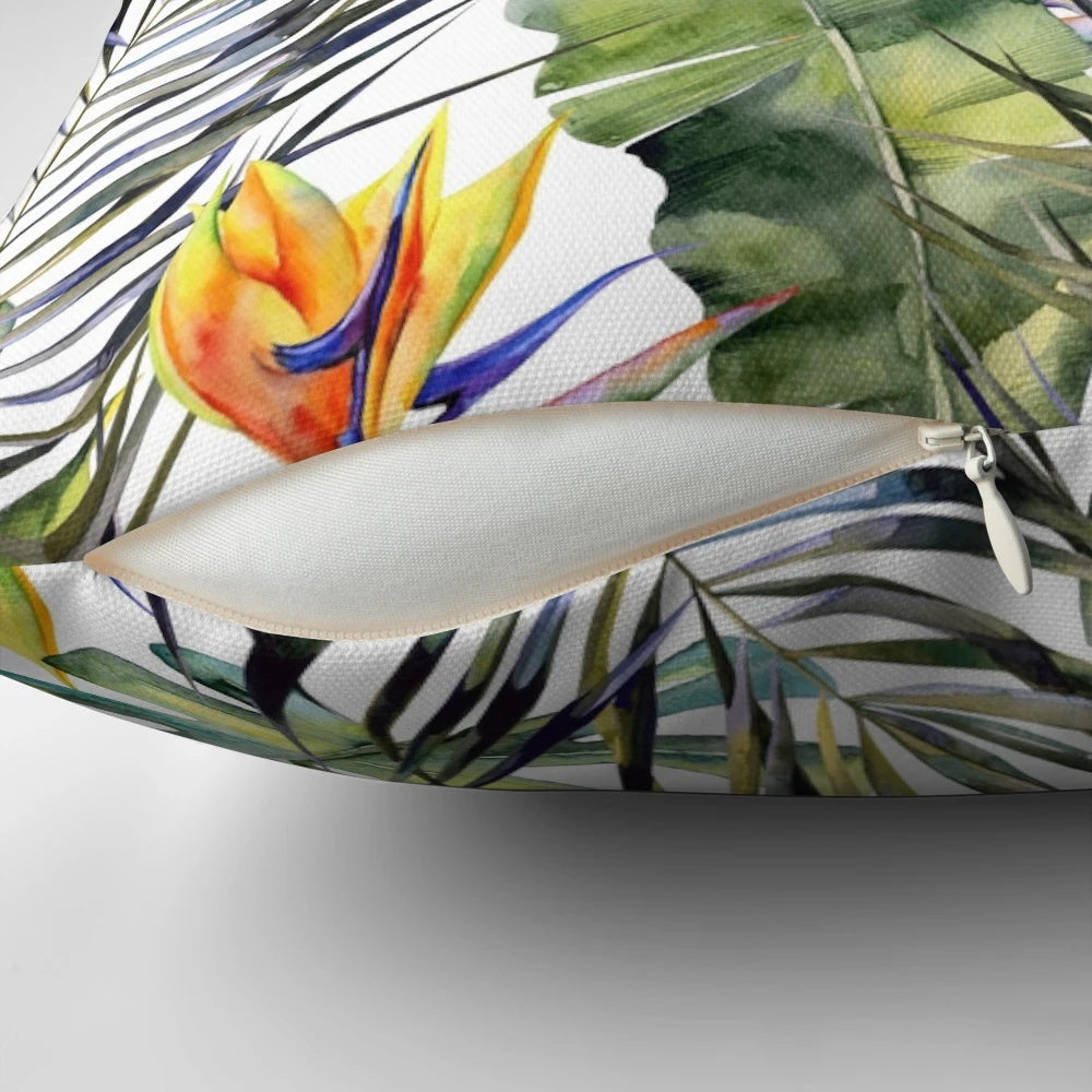 Tropical garden themed decorative pillow cover featuring vibrant watercolor leaves, birds of paradise, and palm fronds.