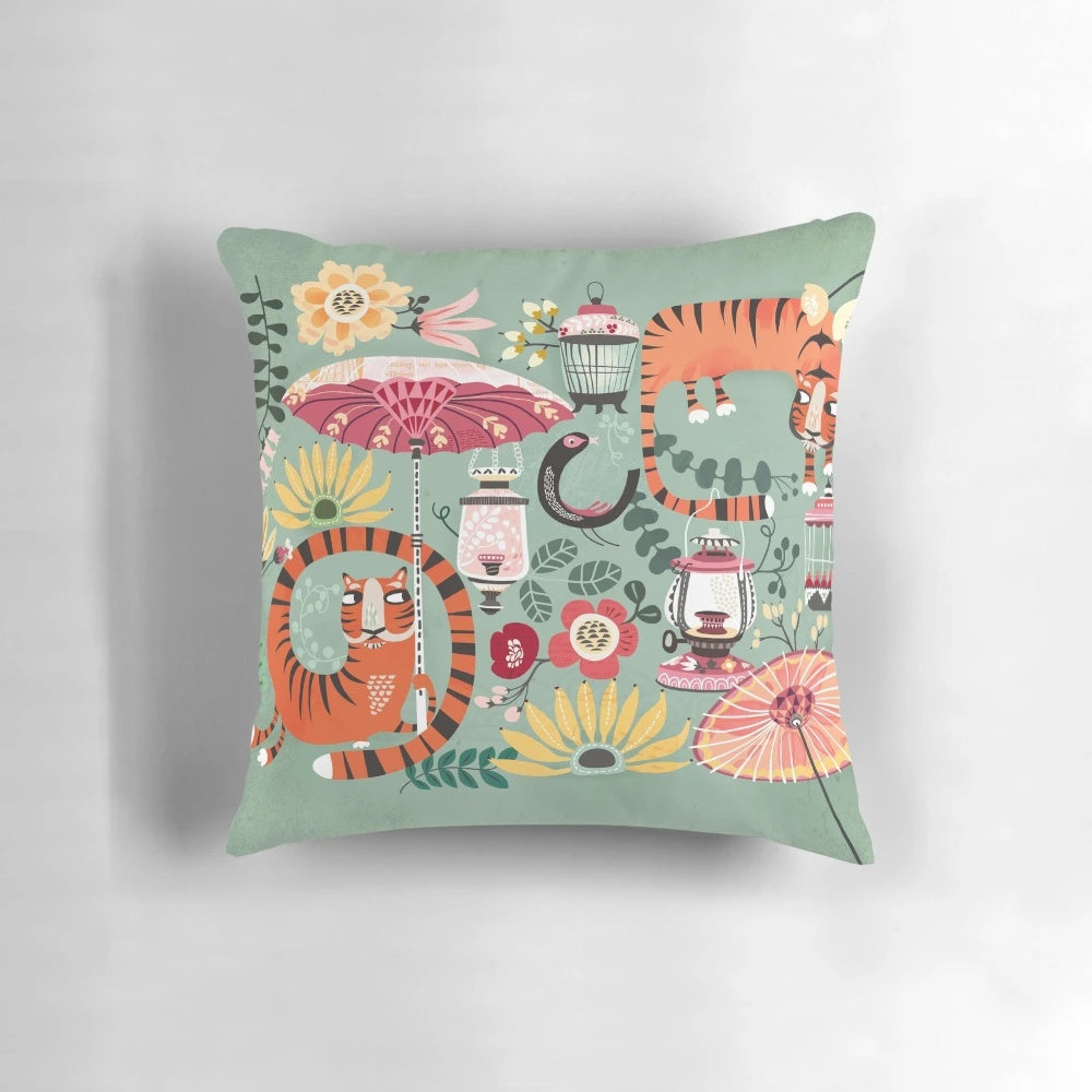 Colorful tropical garden pillow featuring a tiger and lush foliage design