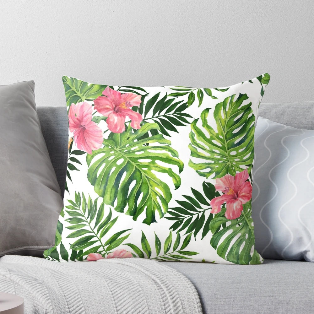 Lush tropical hibiscus flower pattern printed on a high-quality pillow for a refreshing, botanical look.