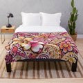 Vibrant tropical island-inspired plush blanket with floral design