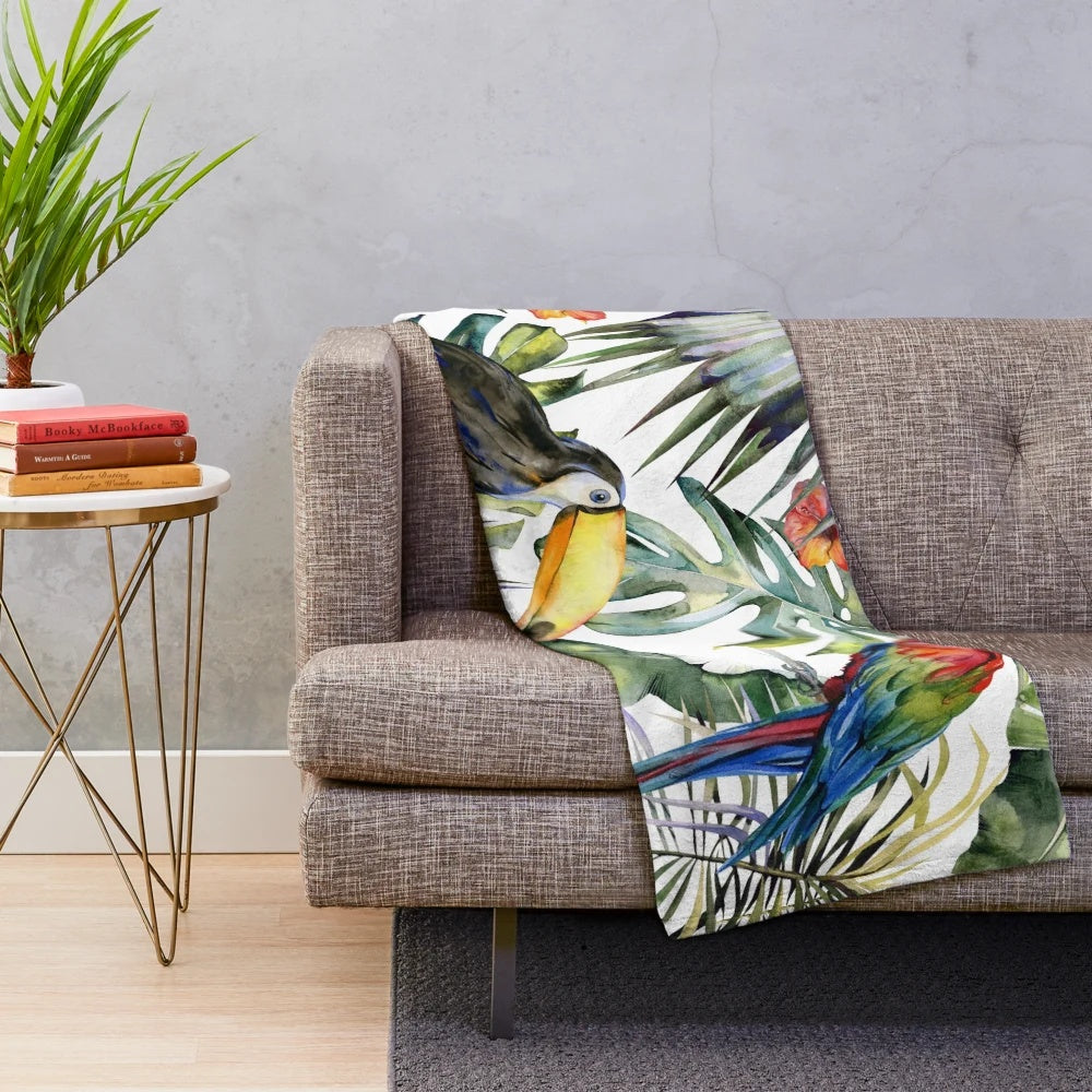 Tropical jungle plush blanket with watercolor design featuring birds and flowers