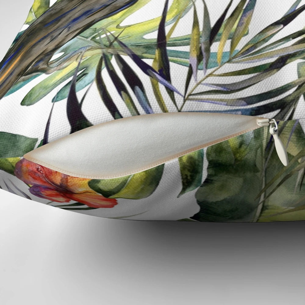 A vibrant throw pillow featuring a tropical jungle scene with watercolor birds, leaves, and flowers.