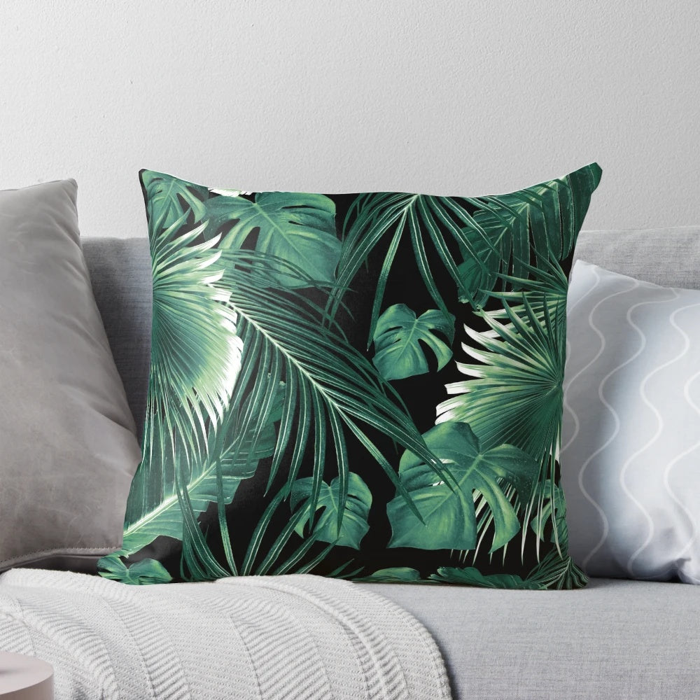 Digital collage of lush, green tropical leaves and foliage in a botanical design
