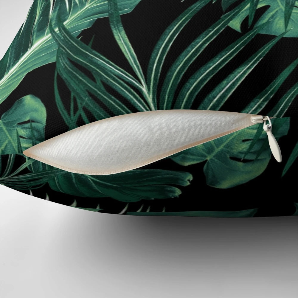 Digital collage of lush, green tropical leaves and foliage in a botanical design