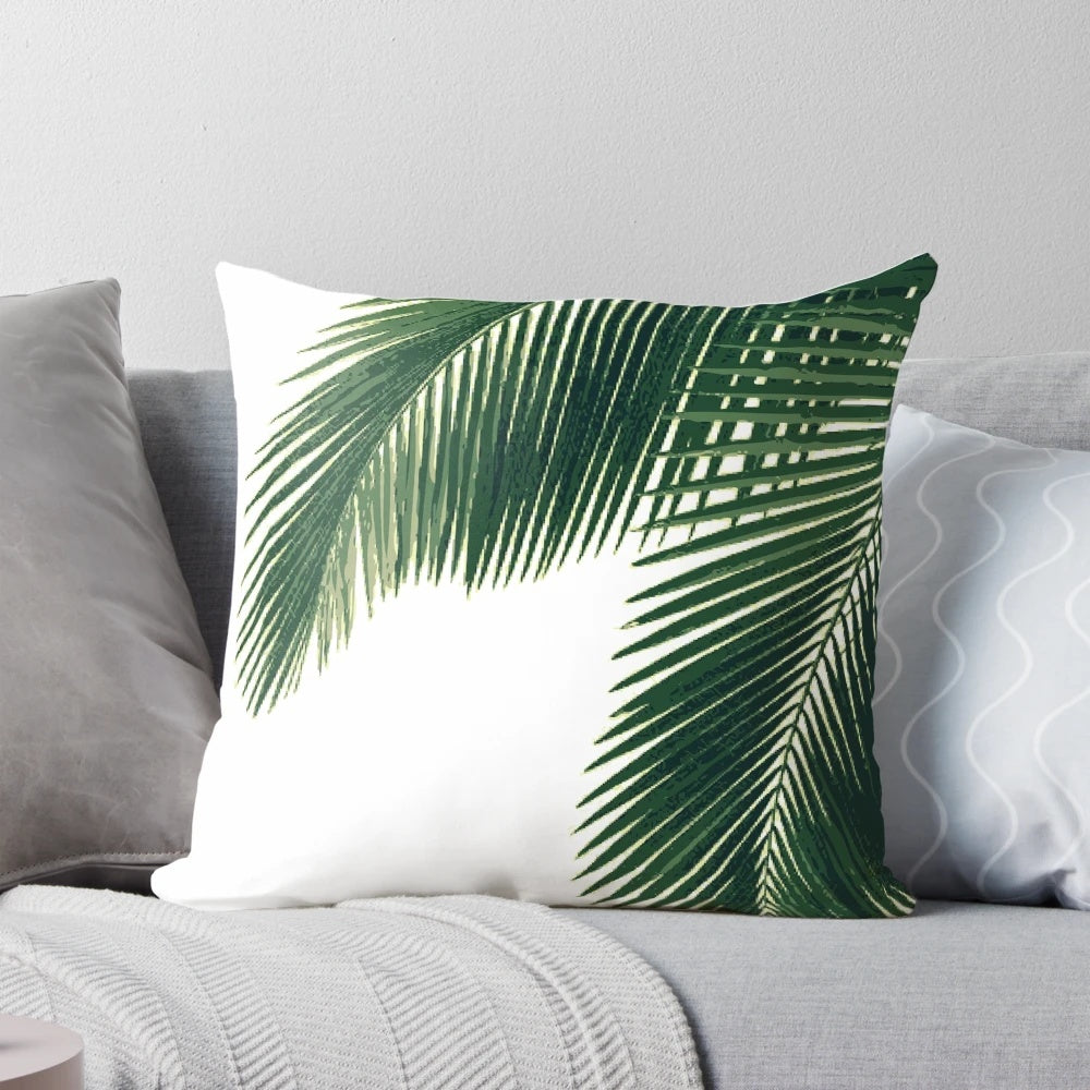 Tropical palm leaves in a watercolor design on a cozy pillow for home decor