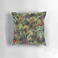Tropical pattern black pillow with strelitzia, monstera, and palm leaf print