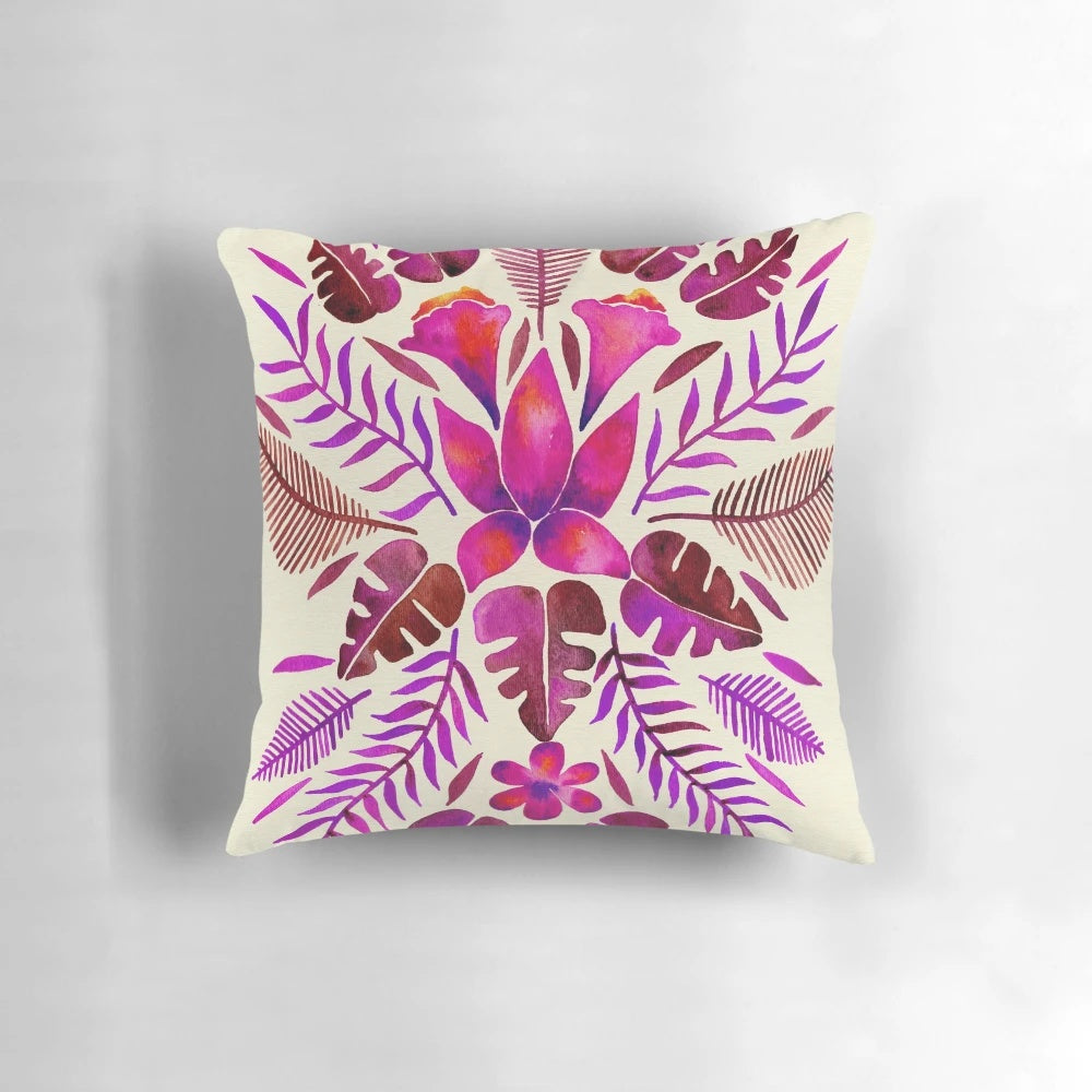 Tropical-inspired magenta throw pillow with symmetrical pattern, perfect for adding a touch of wanderlust to your home decor.