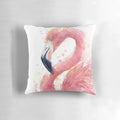 A beautiful watercolor painting of a pink flamingo on a decorative throw pillow.