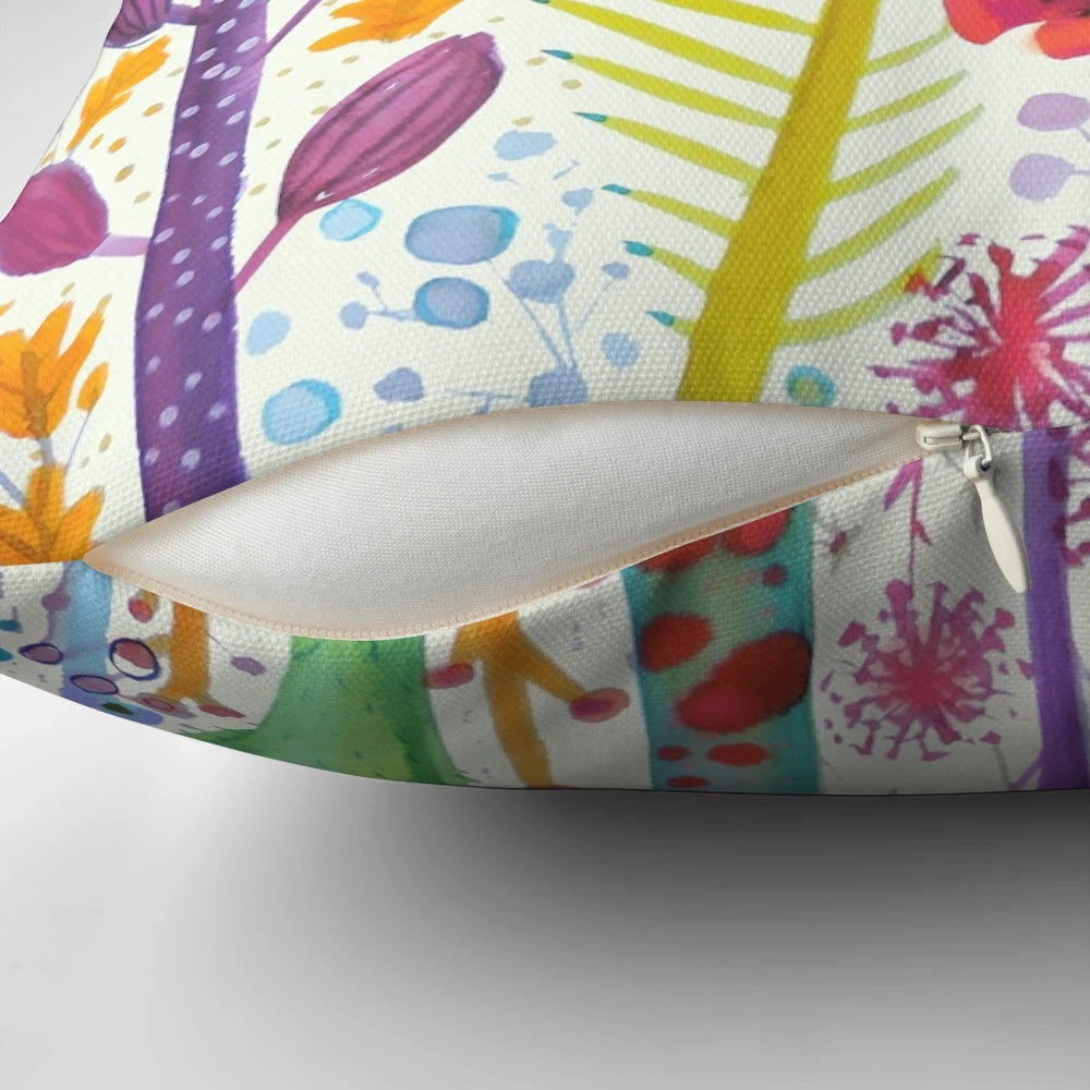 Colorful watercolor floral design on a tropical throw pillow with cactus and botanical elements
