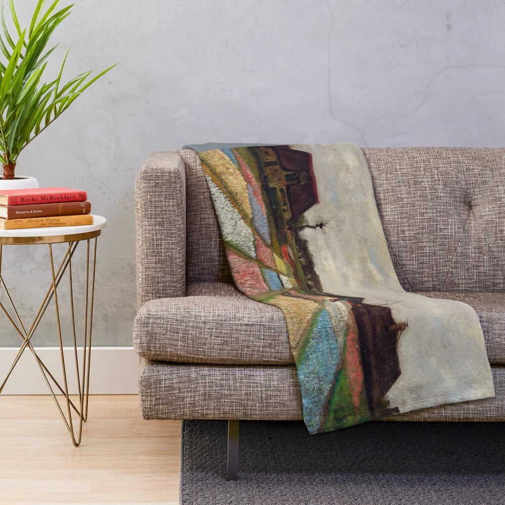 Plush blanket featuring a vibrant tulip field landscape inspired by the art of Vincent Van Gogh