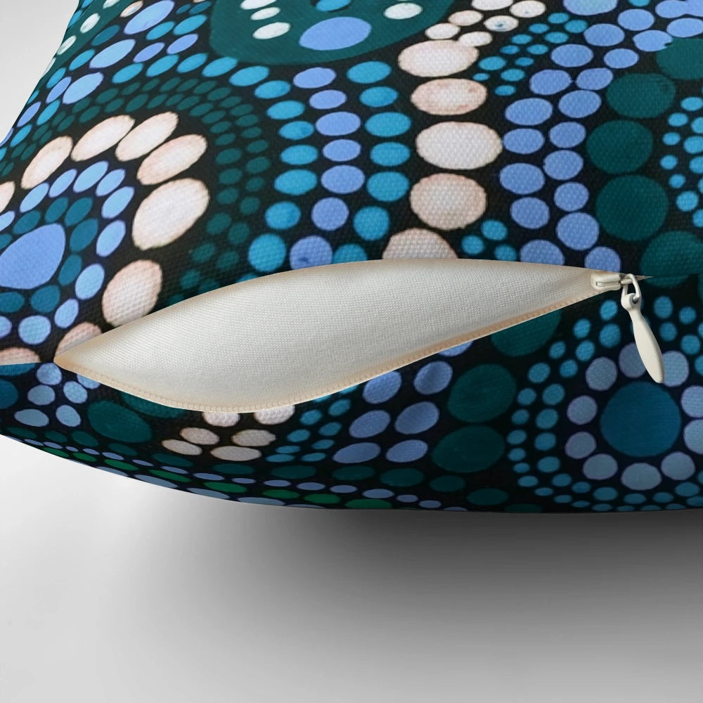 Colorful turquoise blue patterned throw pillow with Australian aboriginal-inspired design