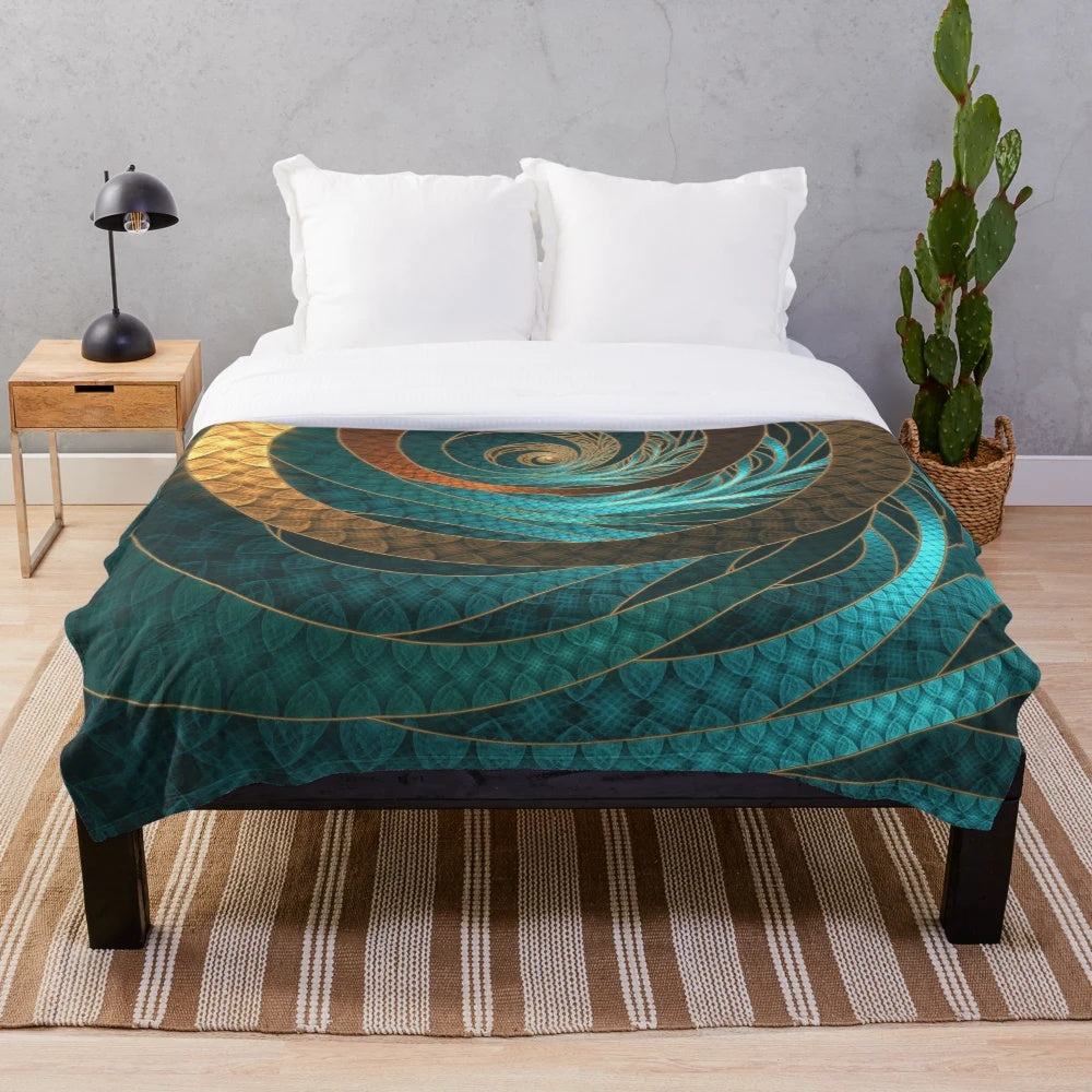 Vibrant turquoise fractal design on a plush blanket