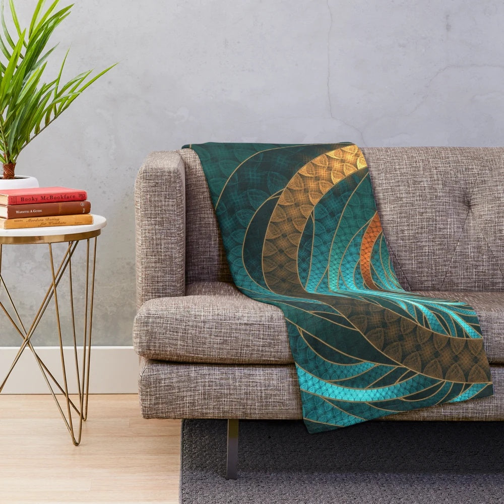 Vibrant turquoise fractal design on a plush blanket