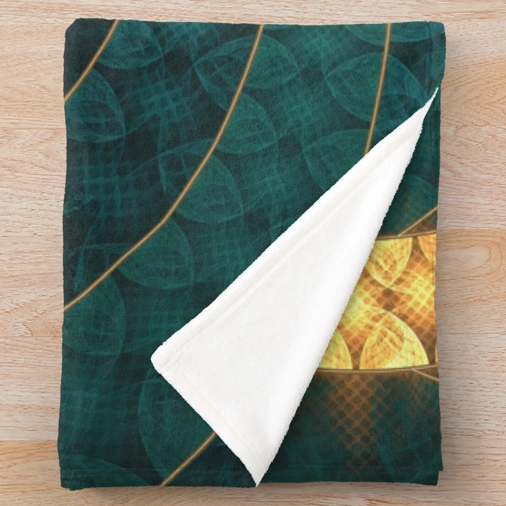 Vibrant turquoise fractal design on a plush blanket
