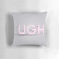 Striking pink neon "UGH" sign against a grey background, showcasing bold typography and modern graphic design