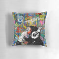 Colorful pop art-inspired urban contemporary pillow featuring a playful monkey thinker or DJ chimp character