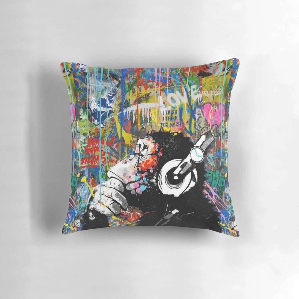 Colorful pop art-inspired urban contemporary pillow featuring a playful monkey thinker or DJ chimp character