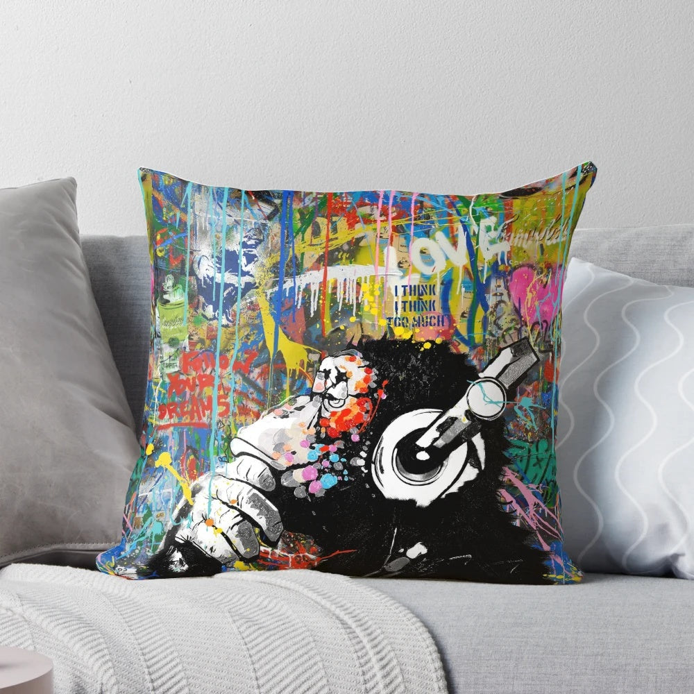 Colorful pop art-inspired urban contemporary pillow featuring a playful monkey thinker or DJ chimp character