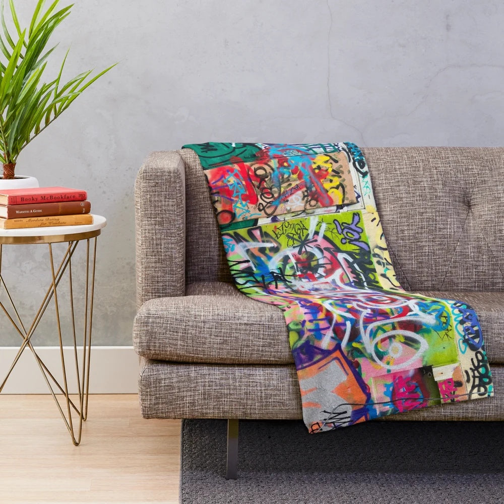 Colorful graffiti-style plush blanket with urban design
