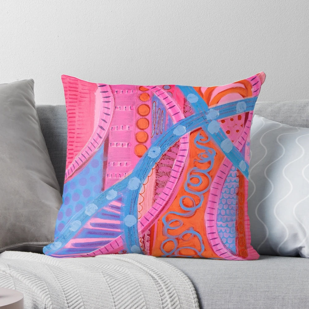 Vibrant, colorful square pillow with abstract urban design