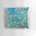Vibrant blue and white almond blossom painting by Vincent Van Gogh printed on a soft, cozy pillow.