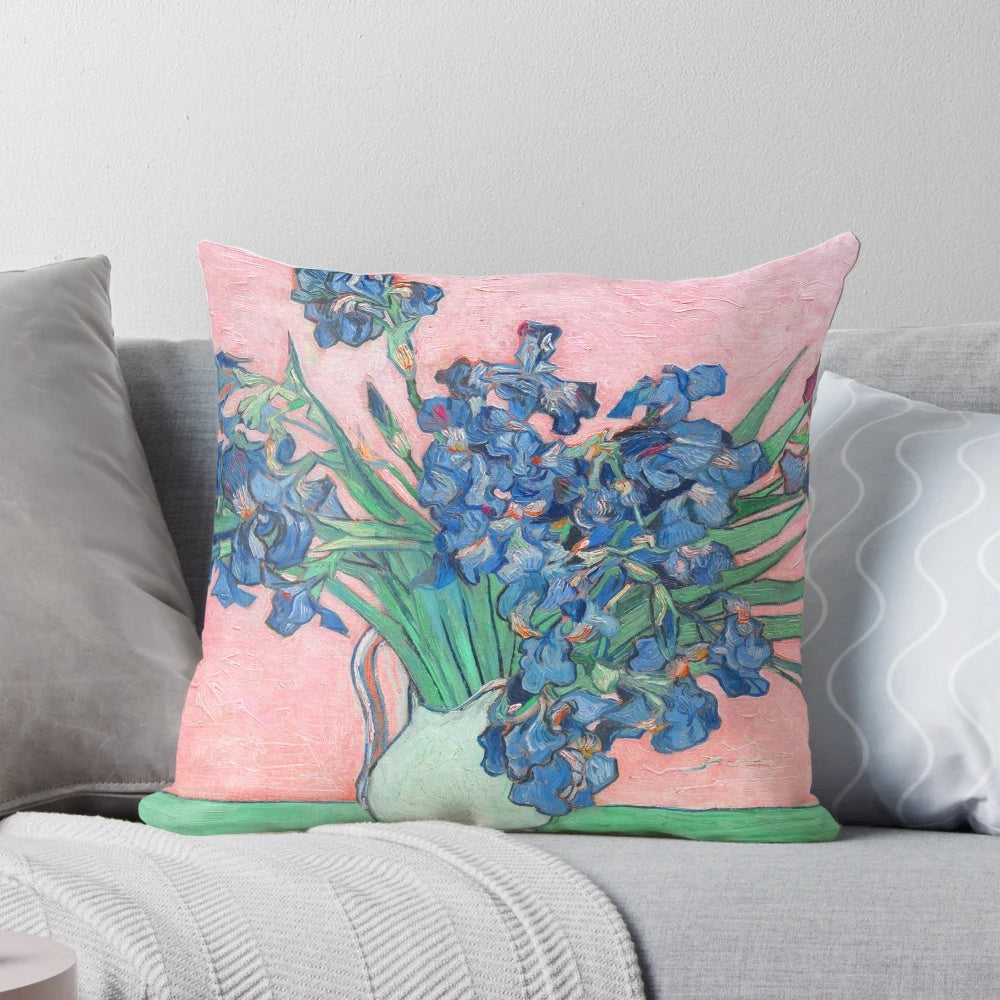Soft, plush pillow featuring the iconic Van Gogh painting of irises in a vase against a pink background.