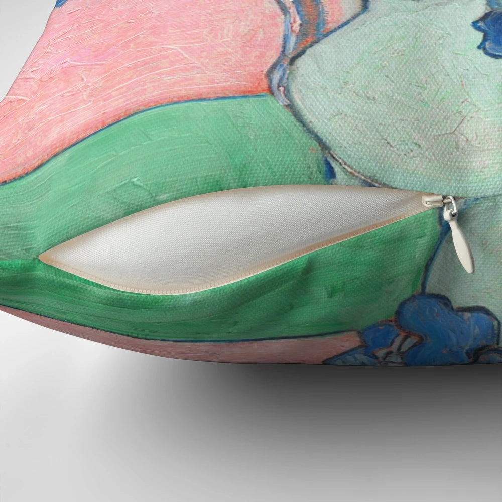 Soft, plush pillow featuring the iconic Van Gogh painting of irises in a vase against a pink background.